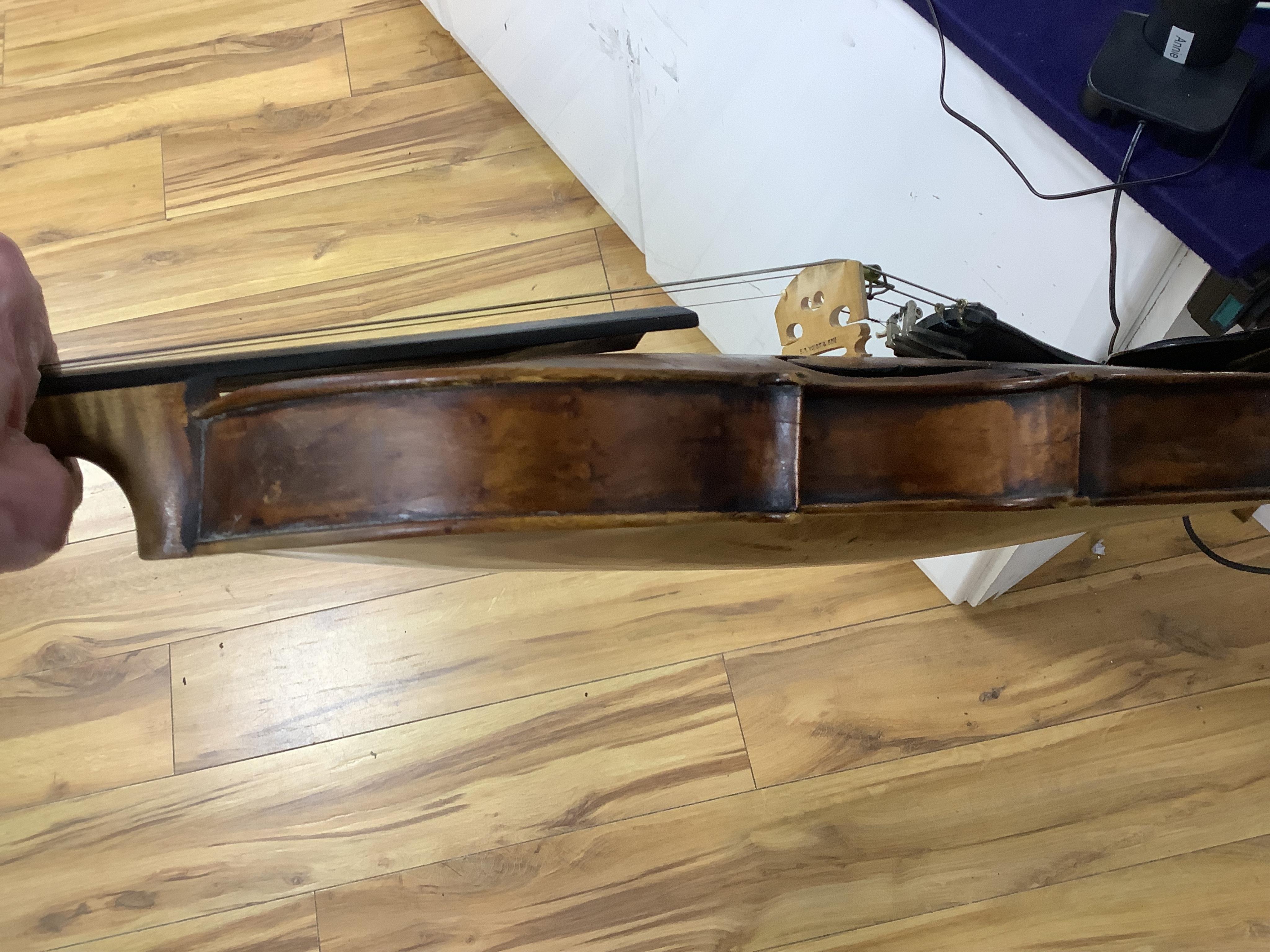 An interesting late 18th century violin, with one piece bird’s eye maple back, unsigned, with two silver fully mounted octagonal bows, one stamped Voight CITES Submission reference, 3XFNUBT7 and Submission reference, RHL